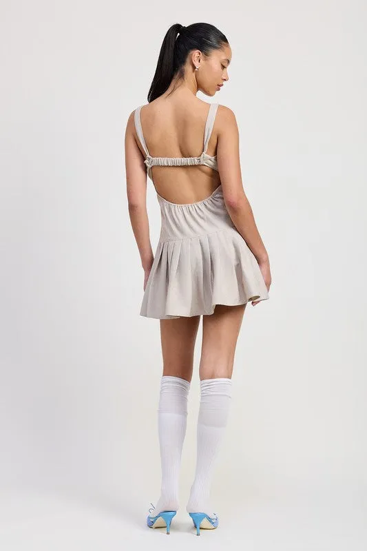 PLEATED MINI DRESS WITH BACK TIES