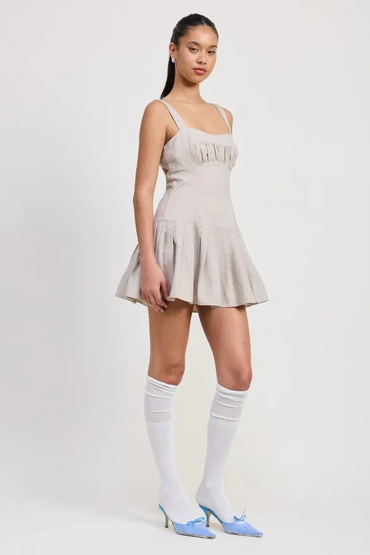 PLEATED MINI DRESS WITH BACK TIES