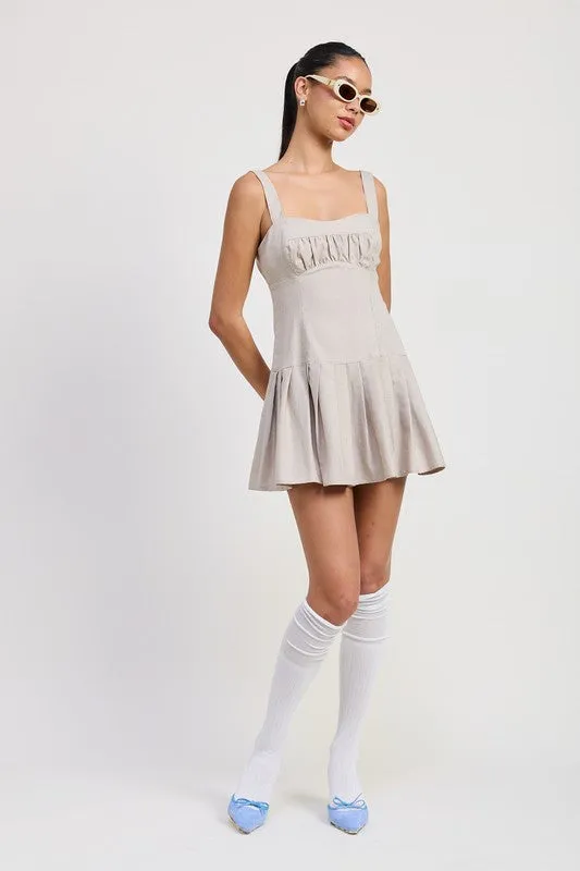PLEATED MINI DRESS WITH BACK TIES