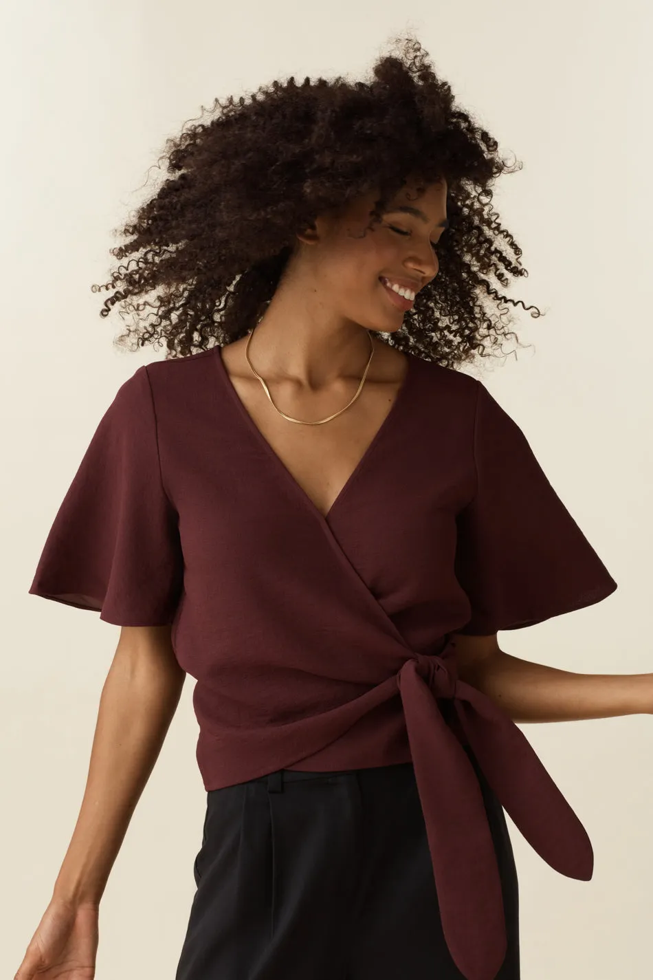 The Flutter Sleeve Wrap Top - Limited Edition