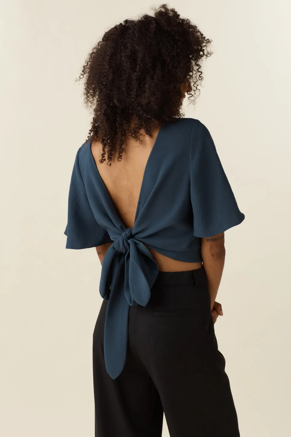 The Flutter Sleeve Wrap Top - Limited Edition