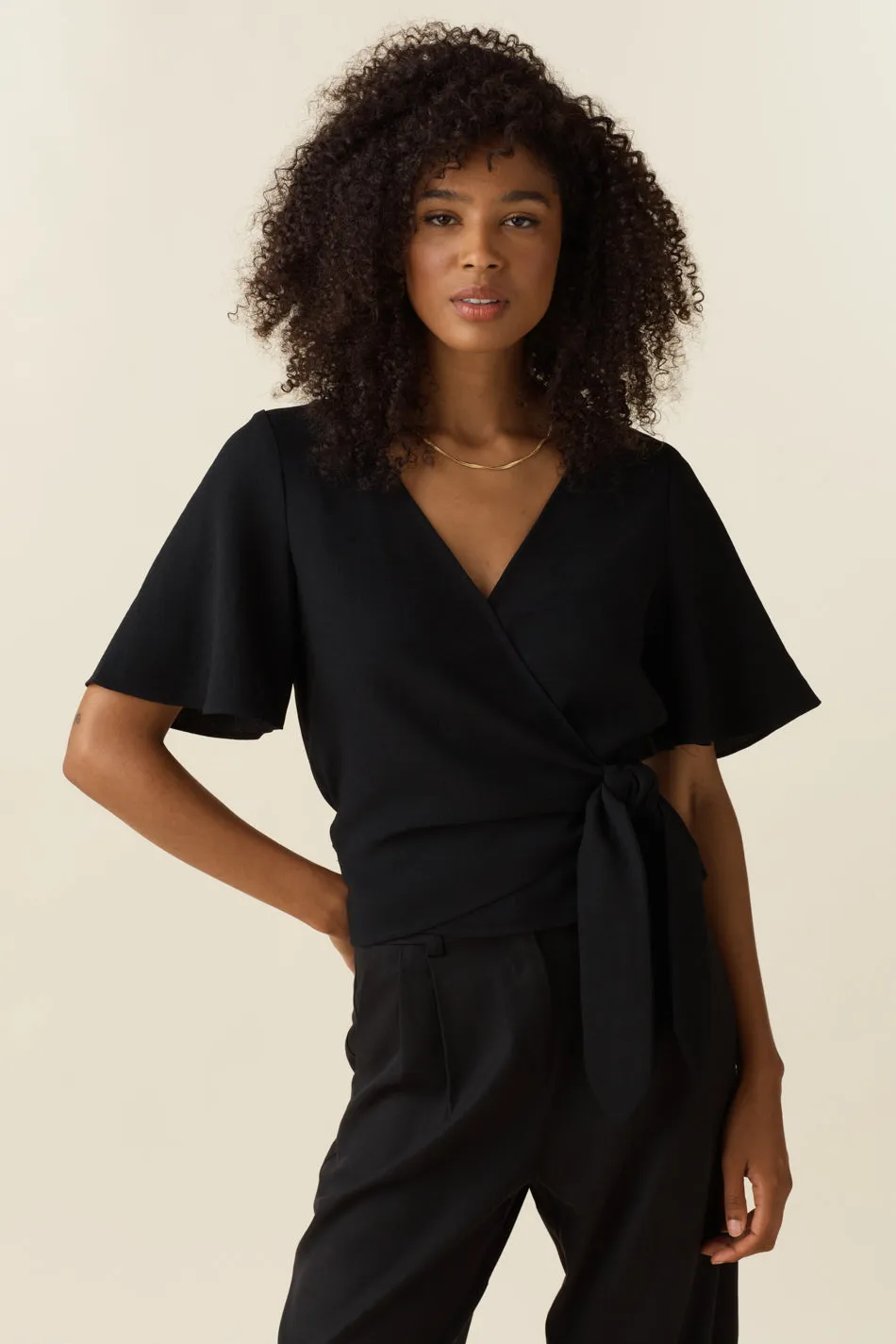 The Flutter Sleeve Wrap Top - Limited Edition