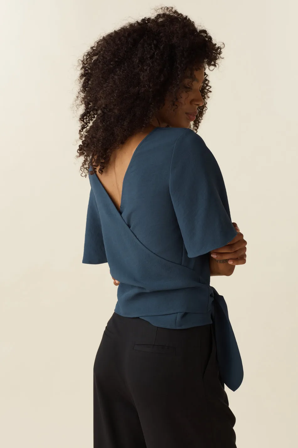 The Flutter Sleeve Wrap Top - Limited Edition