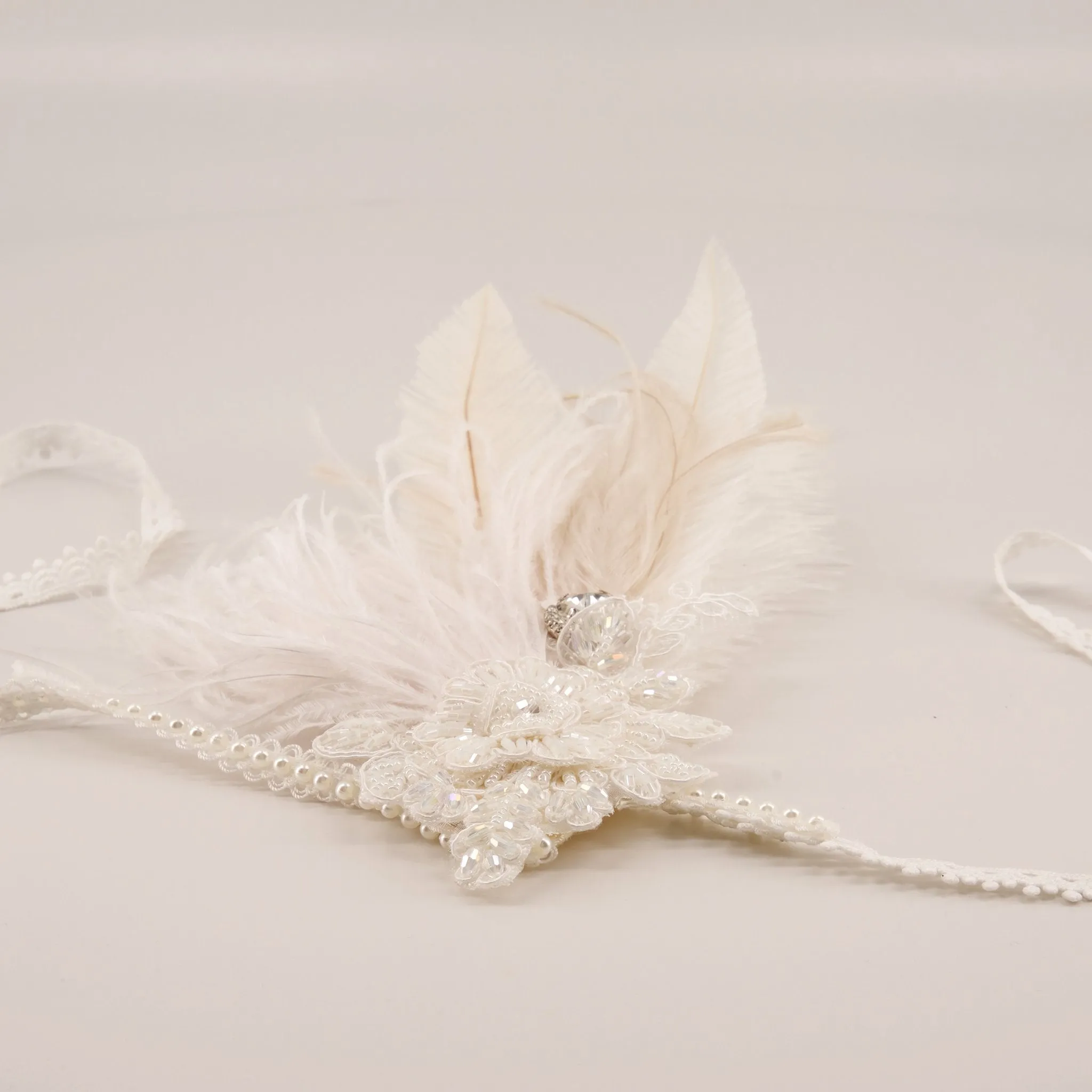 The Joetta Feather Designer Hair Garland